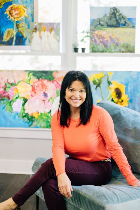 Summer Ray at work on an oil painting