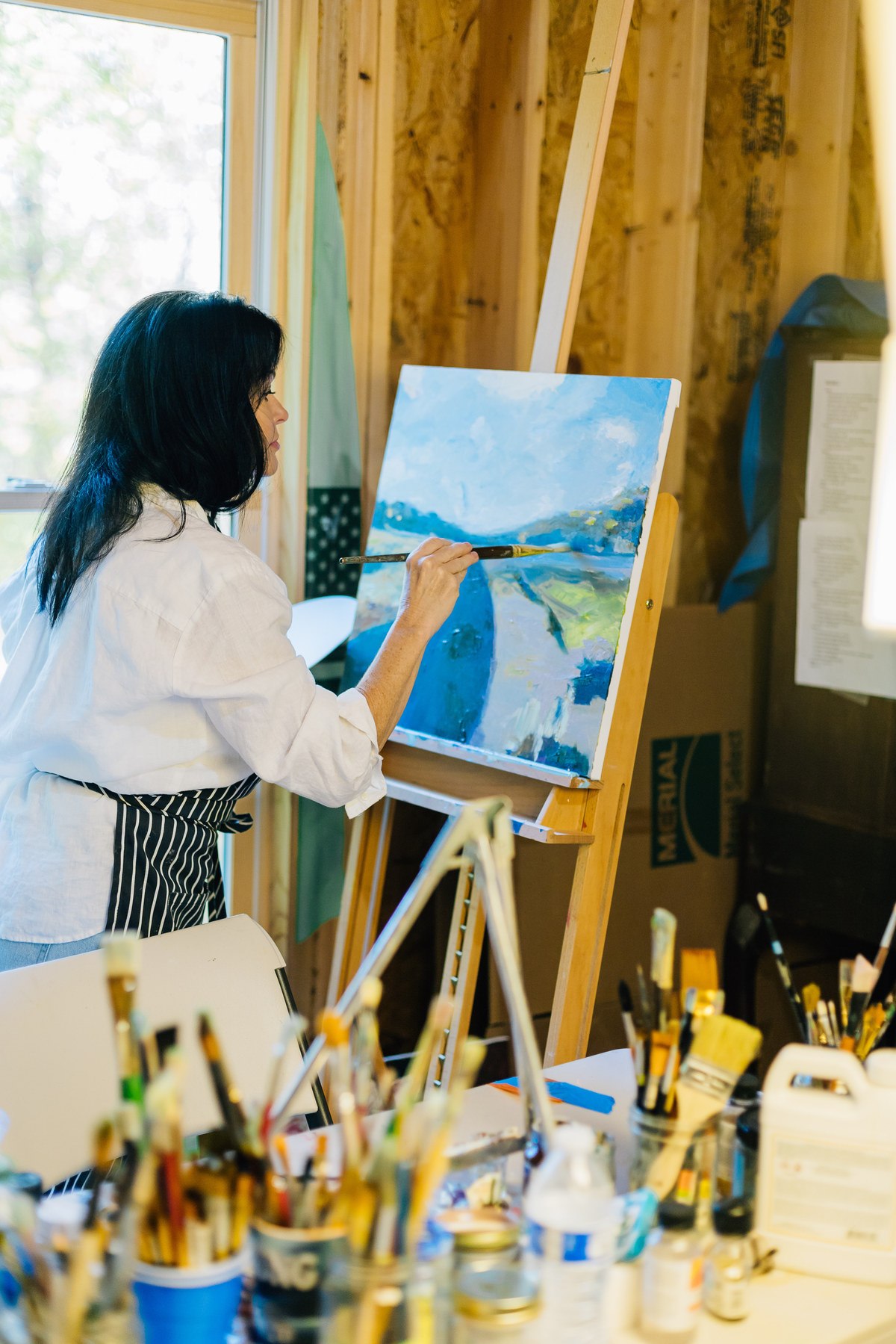 Summer Ray, fine artist, in her Georgia studio